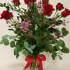 One dozen premium long-stemmed roses arranged, any color,  with a beautiful