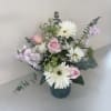 Cloud Nine Blooms is a dreamy arrangement featuring soft pastel hues in