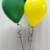 Three helium balloons in green, blue, and yellow with curling ribbons.