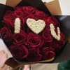 Our 25/50/75 Stem Rose Bouquet with baby's breath logo/initials delivers elegance, romance