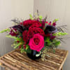 This seasonal delight is crafted with jewel toned roses, spray roses, calla