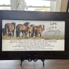 Framed wall art with horses and the words "Life is a Journey"