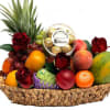 Fruit basket with roses and a box of chocolates