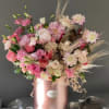 Pink and cream mixed bouquet in a rose-gold box vase