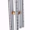 Hanging metal wind chime with a wooden top and oval tag