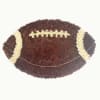Football-shaped floral arrangement with white flower accents