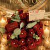 A classic yet contemporary rose arrangement with eucalyptus for any occasion and