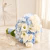 This ethereal bouquet is a vision of purity and grace, blending classic
