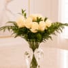   Imagine a bouquet where purity and elegance intertwine. At the