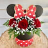 Minnie Mouse-themed bouquet with red roses and white filler flowers