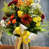  Introducing our Fall Beauty Vase! This stunning arrangement features vibrant mums