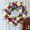 A striking red, white, and blue wreath that expresses pride and honor.