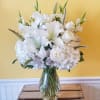 Send a beautiful arrangement as a symbol of your heartfelt compassion. Elegant
