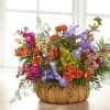 A gorgeous mix of beautiful, bright summer flowers offers an uplifting expression