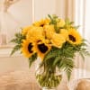 Beautiful sunflowers with yellow roses are the best choice to surprise.