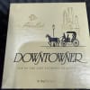 Box of assorted chocolates with a city-themed design
