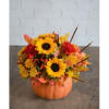 Sunflower arrangement in an orange pumpkin container