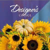 Sunflower arrangement with a decorative pumpkin centerpiece