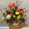 A mix of all the colors of the Fall season. The arrangement