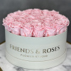 Round box of pink roses