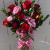This red and pink arrangement is sure to be the sweetest treat!