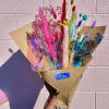 This long lasting all dried floral arrangement is made up of beautiful