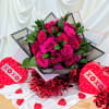 Pink rose bouquet with green leaves and XOXO heart decorations