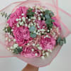 Pink rose bouquet with white baby's breath and eucalyptus in pink wrap