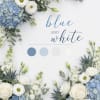 Tones of blue, white and cream create a beautiful flower arrangement perfect
