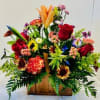Bright, cheerful color bursts of red, orange and sunny yellow make this