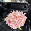 50 pink and white roses and lilies in top.
