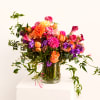 Colorful mixed bouquet in a clear glass vase