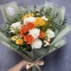 A fresh burst of elegance and sunshine&mdash;this hand-tied bouquet features white roses