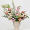 Discover the elegance of our Artful Mauve and Green Flower Arrangement, an