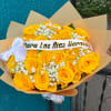 Yellow rose bouquet with white baby's breath and a white ribbon