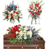 Three floral funeral sprays with a casket arrangement in red, white, and purple