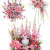 Pink and red floral funeral tribute with a silver urn centerpiece