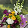 A burst of morning sunshine in a vase, this vibrant design brings