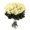 Bouquet of pale yellow roses tied with a white ribbon