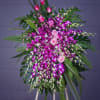 Standing floral spray with pink roses and purple orchids
