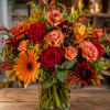 Deep autumn color greets the recipient with deep red roses and bright