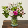 Pink and white mixed bouquet in a clear glass vase