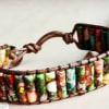 Colorful woven bracelet with a brown cord closure