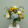 Featuring fresh assorted blooms like hydrangeas and sunflowers, this bouquet is like