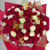 Bouquet of red and white roses with gold butterfly picks