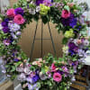 Large floral wreath with pink, purple, and lavender flowers