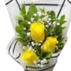 Bouquet of yellow roses with white baby's breath in white wrap