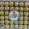 Large box of Ferrero Rocher hazelnut chocolates in gold foil wrappers