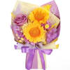 Bouquet of yellow sunflowers and a purple rose wrapped in pastel paper