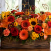 A bold, harvest-ready centerpiece that captures the warmth of autumn, this flower